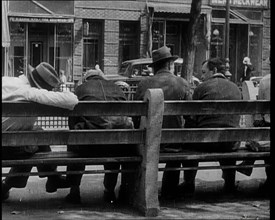 Unemployed People Sitting On a Bench, 1932. Creator: British Pathe Ltd.