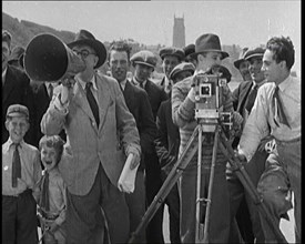 A Group of People Laughing as They Are Watch the Film Being Made from Behind a Camera, 1920s. Creator: British Pathe Ltd.