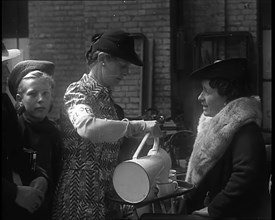 Dutch Refugees Having Tea at  a Reception Centre in the United Kingdom, 1940. Creator: British Pathe Ltd.