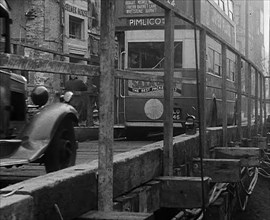 A Bus Driving Across a Wooden Bridge, 1940. Creator: British Pathe Ltd.