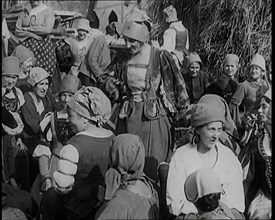 Crowds of Female Actors Wearing Period Costumes Drinking Beer Whilst Filming the German..., 1920s. Creator: British Pathe Ltd.