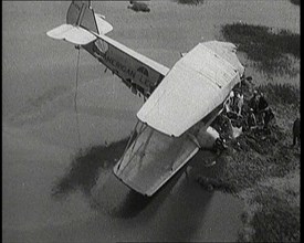 Bystanders Looking at the Wreckage of 'The American Legion' After It Had Crashed, 1927. Creator: British Pathe Ltd.