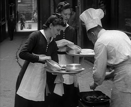 People Preparing Food, 1941. Creator: British Pathe Ltd.