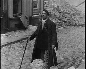 French Refugee Walking Through Demolished Town, 1940. Creator: British Pathe Ltd.