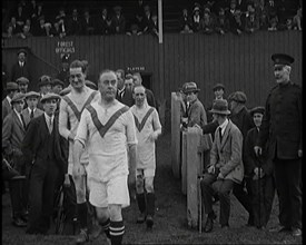 The Comedian George Robey Running Out Onto a Football Pitch in Front of a Large Crowd, 1920s. Creator: British Pathe Ltd.