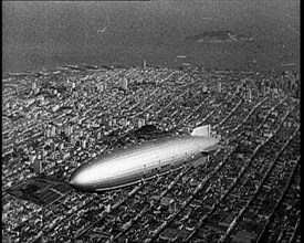 Shot of a Zeppelin Flying Over Manhattan, 1932. Creator: British Pathe Ltd.