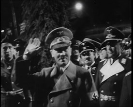 Adolf Hitler, the German Leader with Arm Raised in Salute With Various Male..., 1937. Creator: British Pathe Ltd.