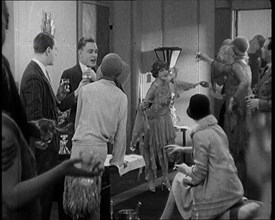 Scene from a 1920s Film. A Group of Actors Playing Bright Young Things Having a Cocktail Party,1920s Creator: British Pathe Ltd.