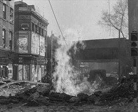 A Burning Bomb Crater, 1940. Creator: British Pathe Ltd.