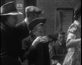 Dutch Refugees Having Tea at a Reception Centre in the United Kingdom, 1940. Creator: British Pathe Ltd.