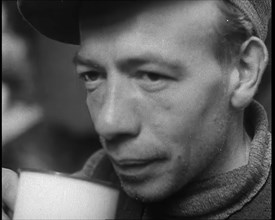 Dutch Refugee Drinking Tea at a Reception Centre in the United Kingdom, 1940. Creator: British Pathe Ltd.