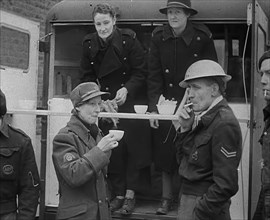 Civil Defence Corps Members Drinking Tea, 1940. Creator: British Pathe Ltd.