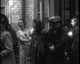 Dutch Refugees Entering a Reception Centre in the United Kingdom, 1940. Creator: British Pathe Ltd.