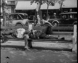 Unemployed People Lying On a Bench, 1932. Creator: British Pathe Ltd.