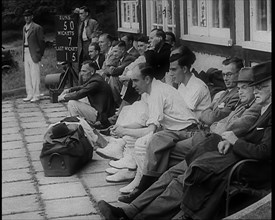 Men, Some in Cricket Gear, 1940. Creator: British Pathe Ltd.