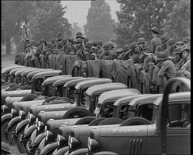 US Army Trucks and Cars Lining the Road, 1932. Creator: British Pathe Ltd.