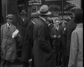 Civilians Disembarking from a Bus On the Streets of London, 1920s. Creator: British Pathe Ltd.