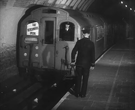 A Tube Train Stopping, 1940. Creator: British Pathe Ltd.