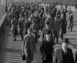 Civilians Crossing a Bridge in London, 1940. Creator: British Pathe Ltd.