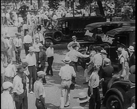 Police Officers Confronting Protesting Soldiers  To Disperse the Army Veterans, 1932. Creator: British Pathe Ltd.