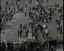 Looking Down Into One of the Enclosures at  Goodwood Race Course in Sussex with Spectators..., 1939. Creator: British Pathe Ltd.