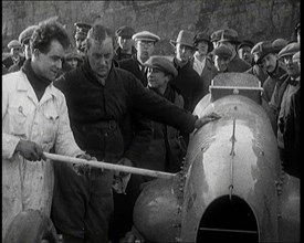 Malcolm Campbell Preparing his Car 'Bluebird' Watched By a Crowd of Civilians, 1927. Creator: British Pathe Ltd.