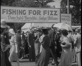 Male and Female Patrons at  a Theatrical Garden Party at  the Ranelagh Club, Barnes..., 1939. Creator: British Pathe Ltd.