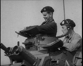 Two British Tank Operators Looking Out of a Tank Turret, 1940. Creator: British Pathe Ltd.