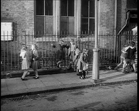 Children Playing Outside, 1940. Creator: British Pathe Ltd.