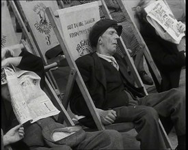 Close up on a Man in a Flat Cap and With a Neckerchief Sleeping in a Deck Chair on the Prom..., 1938 Creator: British Pathe Ltd.