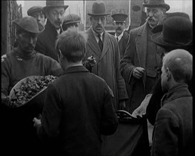 A Group of People Waiting To Receive a Measure of Coal, 1924. Creator: British Pathe Ltd.