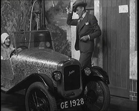 Jack Hulbert Climbing Into a Car, 1920s.  Creator: British Pathe Ltd.