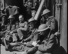 British Soldiers Sitting Aboard a Ship Taking Them Across the Channel Following the..., 1940. Creator: British Pathe Ltd.