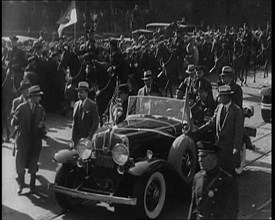 Pierre Laval, the French Premier, in an Open Top Car Driving Though the Crowded Streets..., 1932. Creator: British Pathe Ltd.