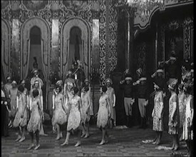 Scene from the Musical Princess Charming: a Group of Actors Dancing As the Actor Playing..., 1920s. Creator: British Pathe Ltd.