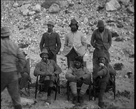 A Team of Eight Climbers Including Andrew Irvine and George Leigh Mallory Posing at the Foot...,1924 Creator: British Pathe Ltd.