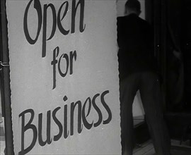 A Sign Reading 'Open for Business', 1941.  Creator: British Pathe Ltd.