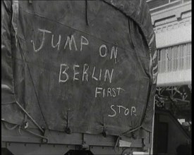 Chalk Graffiti on the Tarpaulin Covering a Lorry Reading 'JUMP on BERLIN FIRST STOP', 1939. Creator: British Pathe Ltd.