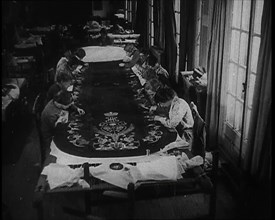 Seamstresses Sewing the Embroidery on the Coronation Mantle of King George VI, 1937. Creator: British Pathe Ltd.