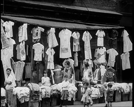 Street View of Street Market Selling Clothes in New York City, 1932. Creator: British Pathe Ltd.