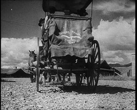 Coach and Horses Waiting To Pick up Passengers Arriving Off the Train, 1932. Creator: British Pathe Ltd.