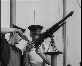 British Sailors Mounting Machine Guns To Small Boats for the Dunkirk Evacuation, 1940. Creator: British Pathe Ltd.