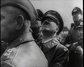 Adolf Hitler Standing With a Group of Other Male German Military Commanders and Looking Upwards,1939 Creator: British Pathe Ltd.