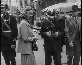 French Police Checking People's Papers Outside a Cafe in Paris, 1940. Creator: British Pathe Ltd.