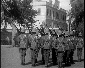 Soldiers Carrying Rifles Patrolling Outside the Egyptian Palace After the Assassination of..., 1924. Creator: British Pathe Ltd.