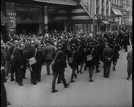 French Police Checking People's Papers Outside a Cafe in Paris, 1940. Creator: British Pathe Ltd.