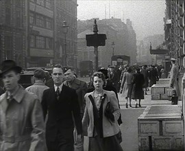 Civilians Walking Down a Street, 1942. Creator: British Pathe Ltd.