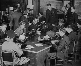 Uniformed Press Officers Working, 1943. Creator: British Pathe Ltd.