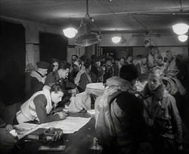 RAF Pilots Planning and Chatting to Each Other, 1942. Creator: British Pathe Ltd.