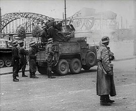 German Soldiers Standing Next to a Truck-Mounted Gun, 1942. Creator: British Pathe Ltd.